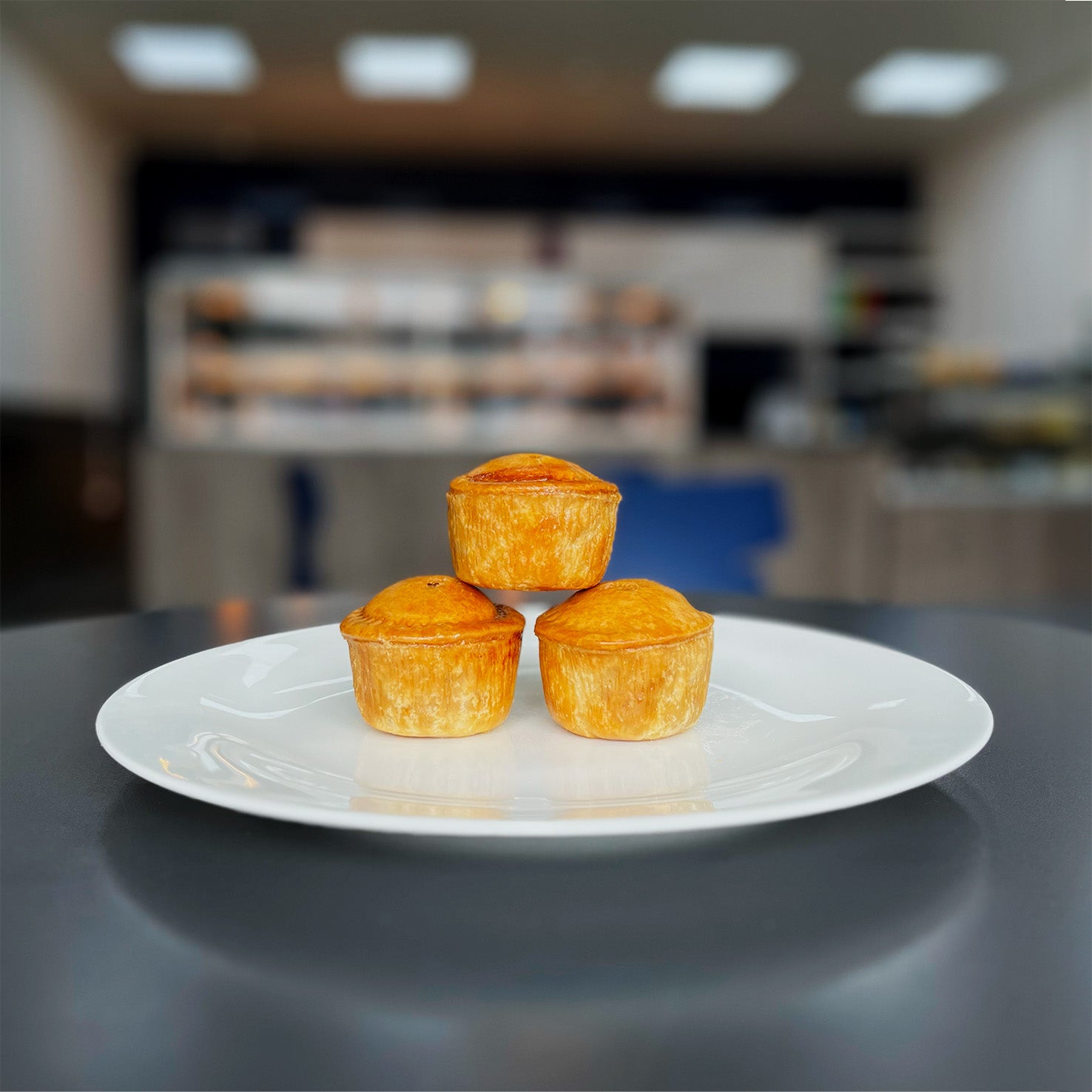 Buy traditional whist pies online. The famous Whist pie originates in Lancashire, UK. Filled with beef, bacon and other flavours, wrapped in a flaky pastry. The best whist pies in the UK.  